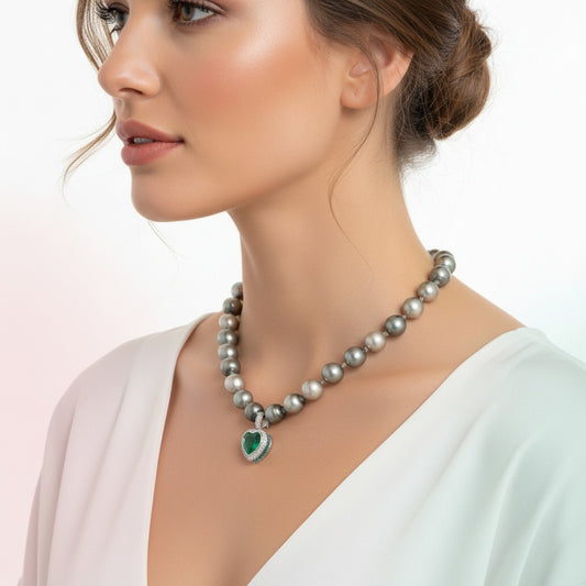 A Beautiful 4.20ct Emerald heart and Diamond attachment pendant Pendant Buchwald