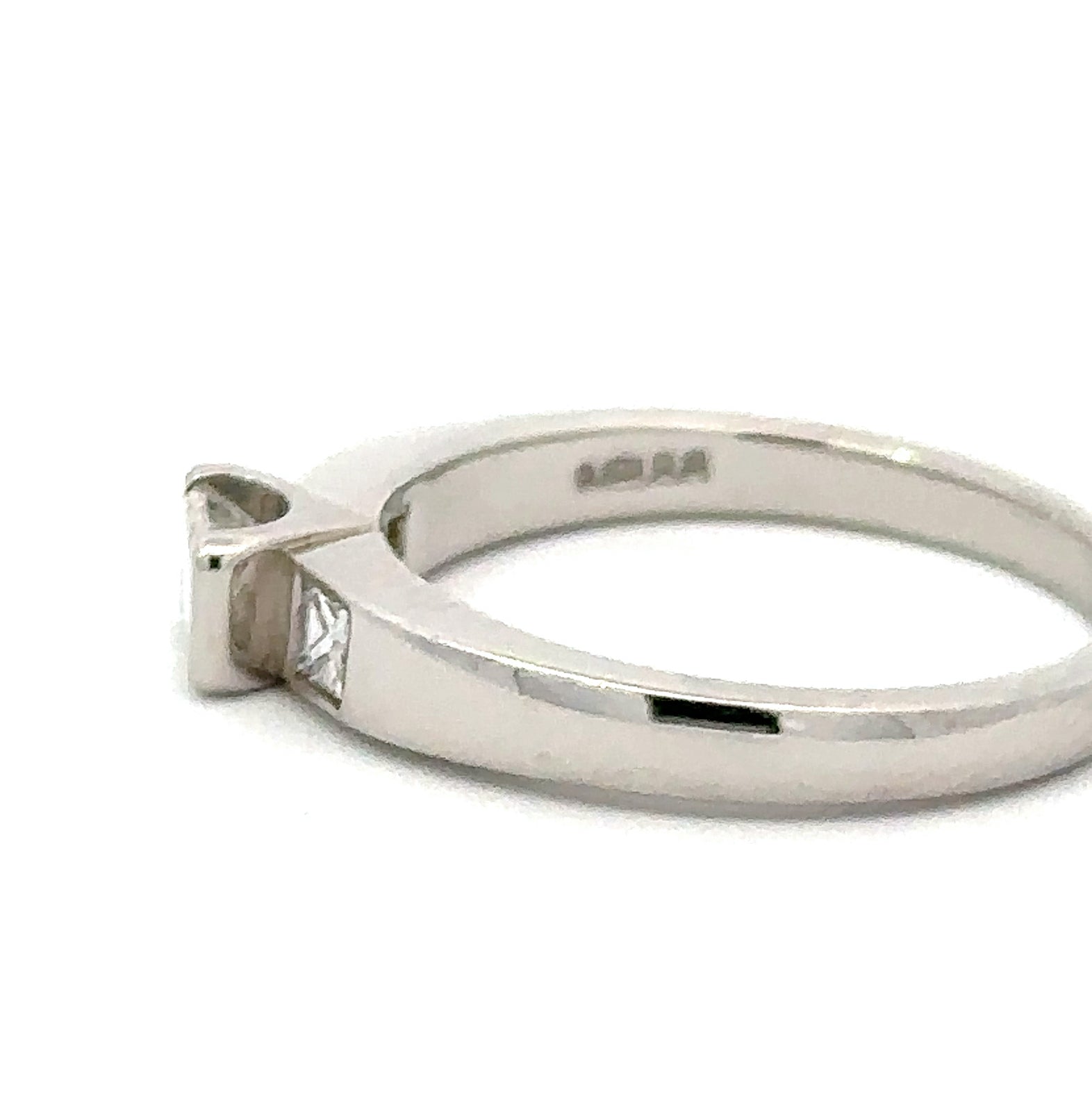 Platinum Trilogy emerald cut 0.59ct natural diamond ring FVVS Ring Christopher Wharton