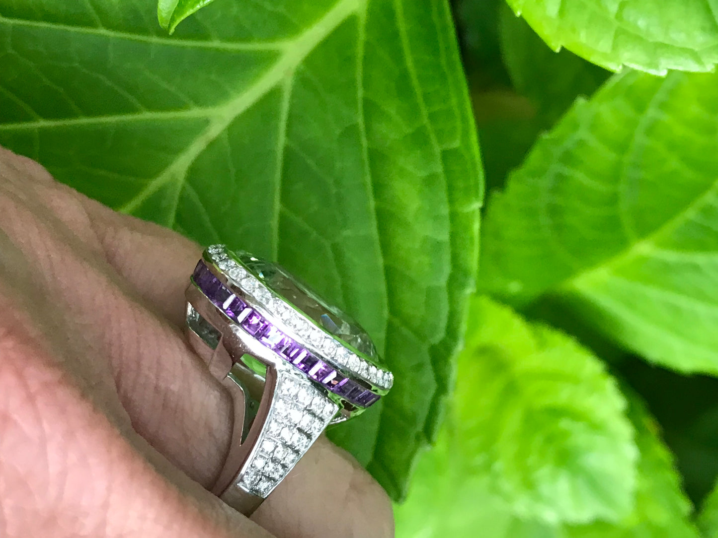 18ct White gold 14.32ct Green Beryl ring surrounded by amethyst and diamonds Ring Buchwald