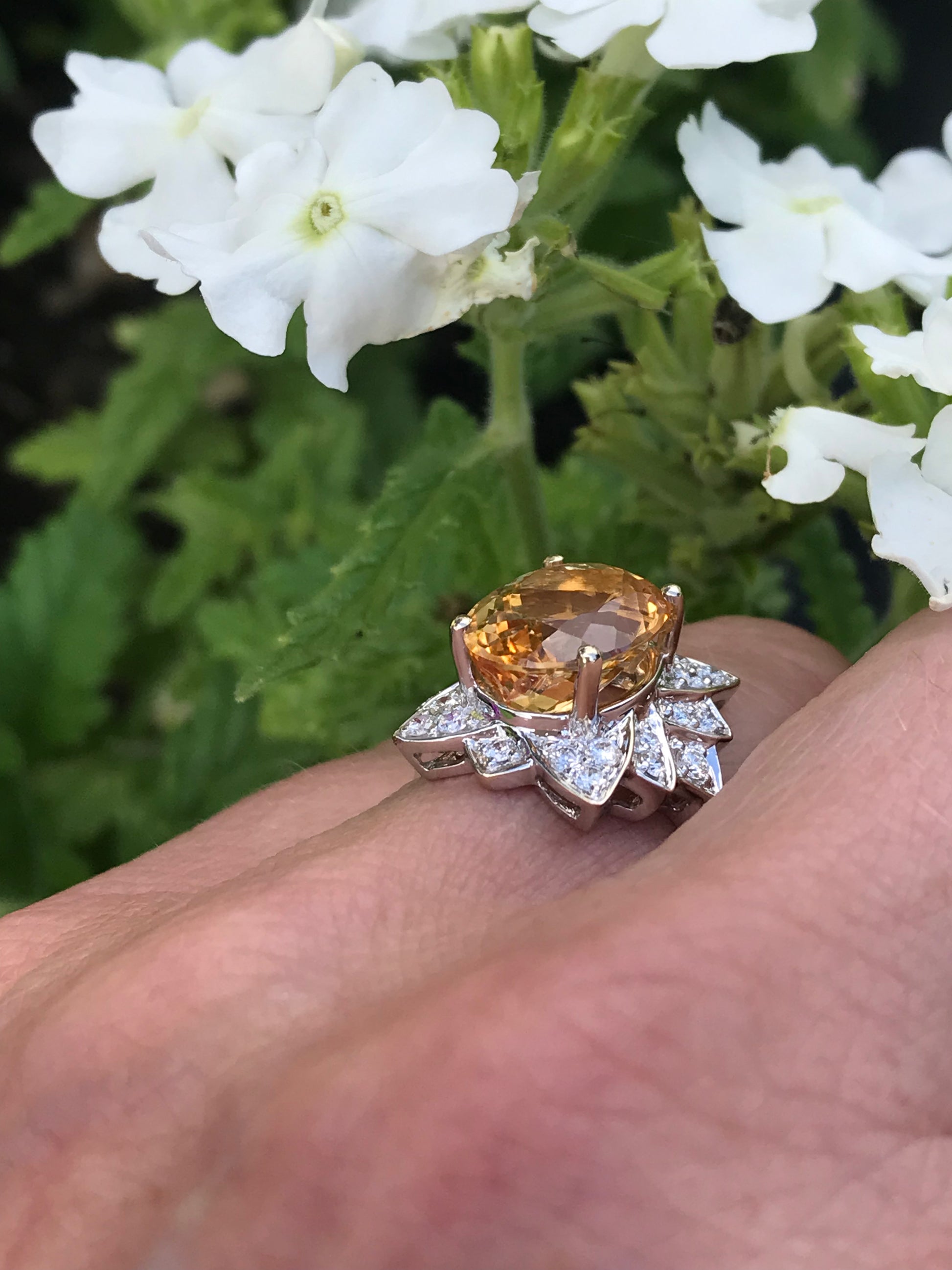 White gold imperial topaz ring set with a floral diamond surround Ring Rock Lobster