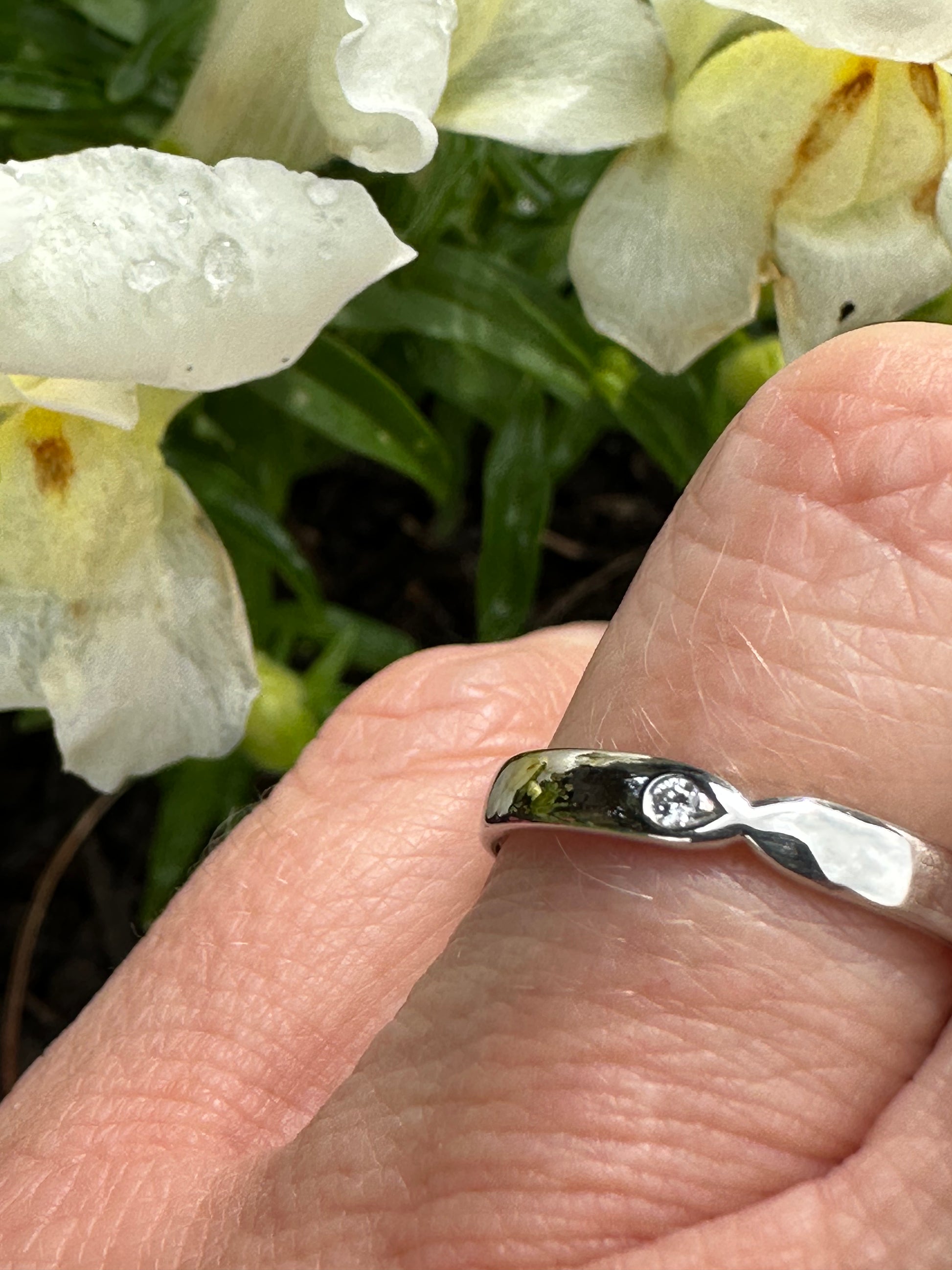 Furrer Jacot Platinum diamond set band with pinched centre Ring Furrer Jacot