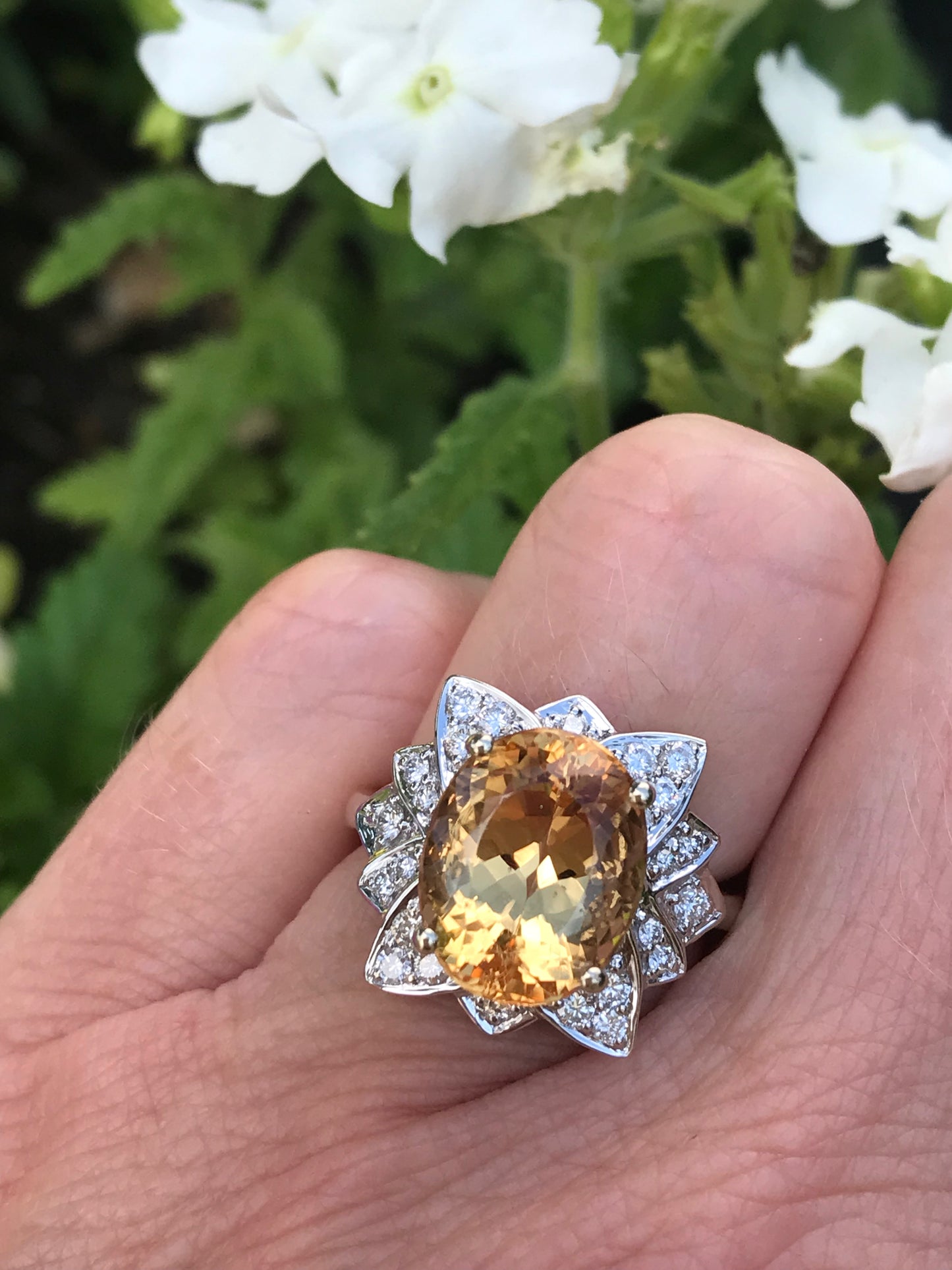 White gold imperial topaz ring set with a floral diamond surround Ring Rock Lobster