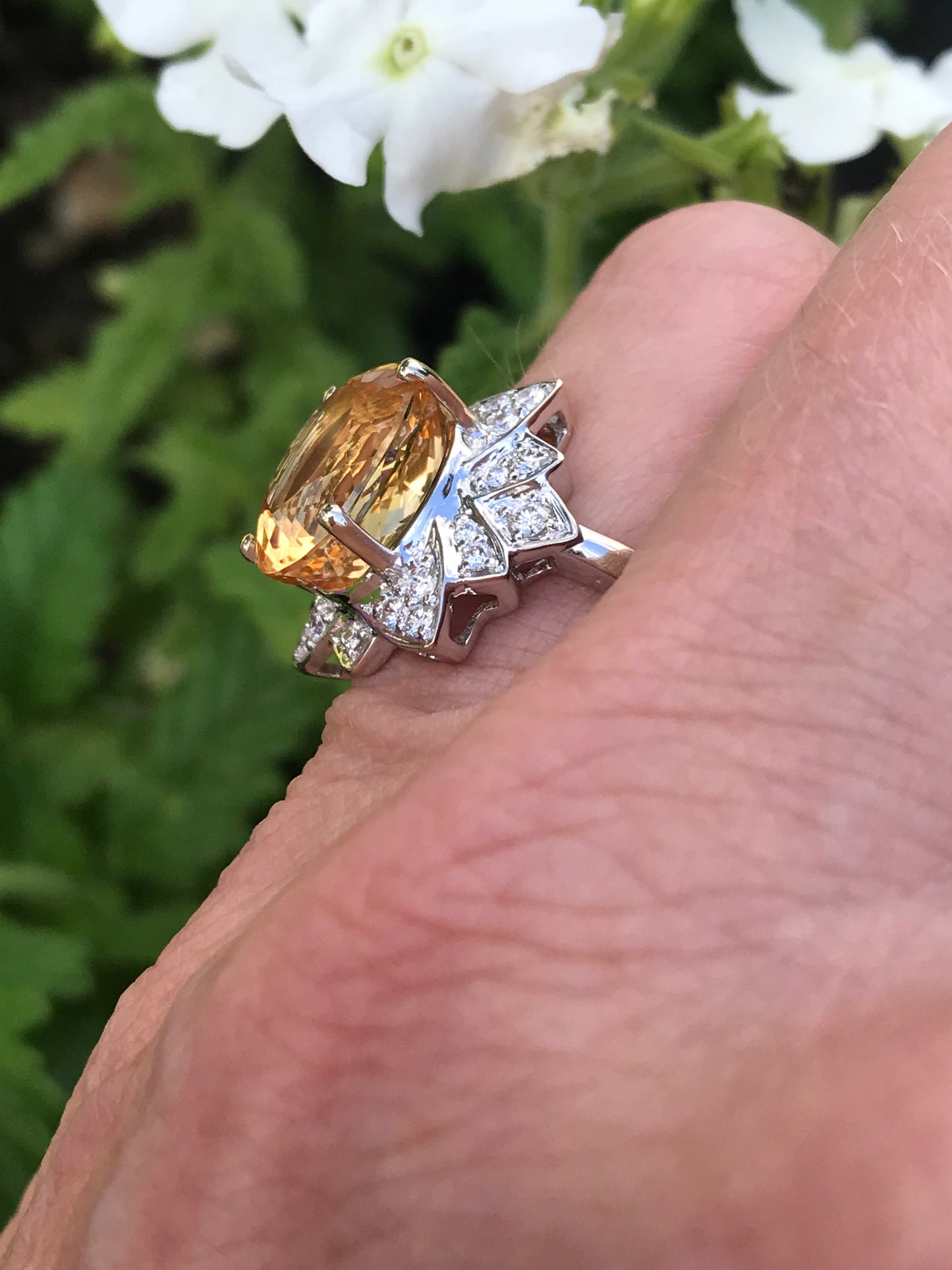 White gold imperial topaz ring set with a floral diamond surround Ring Rock Lobster