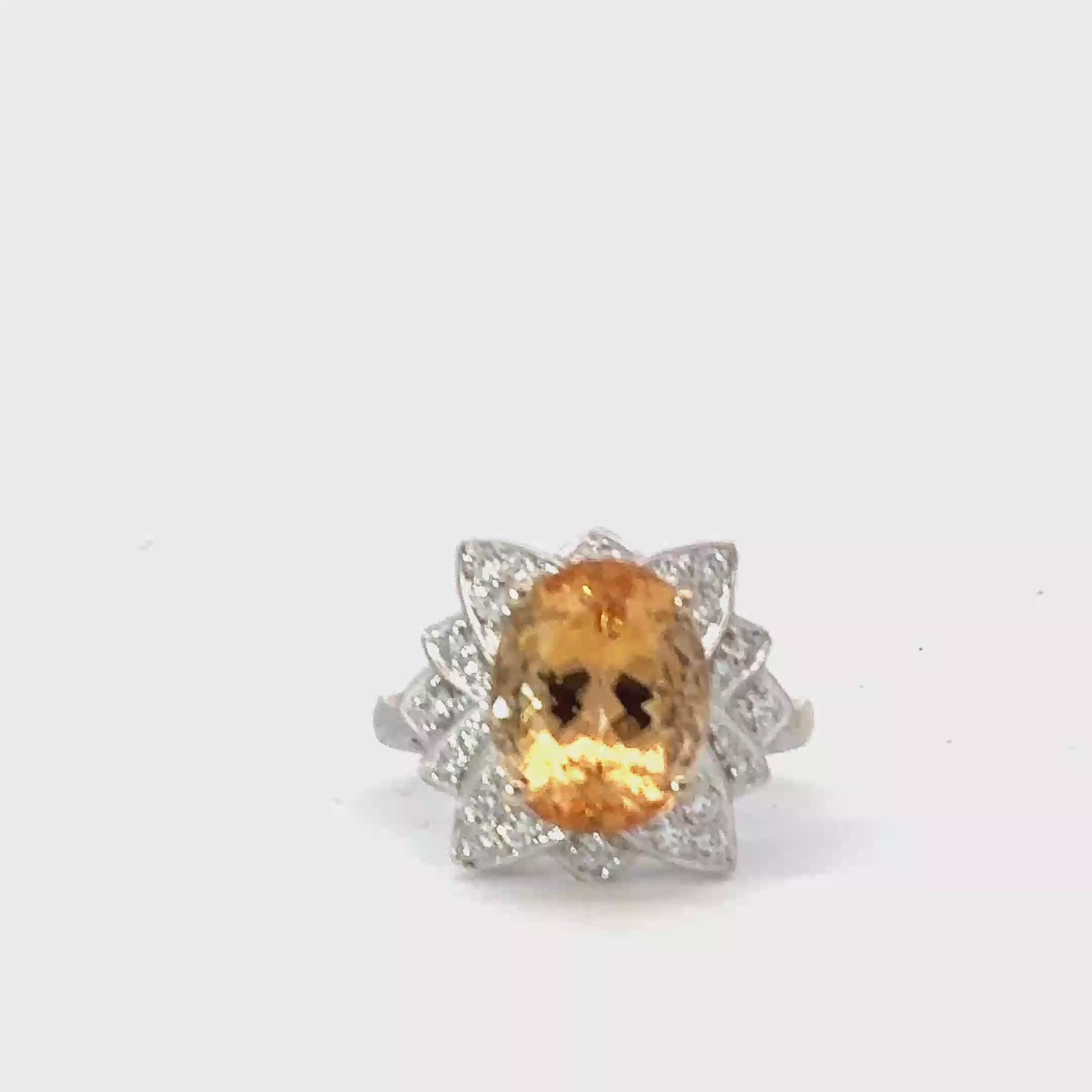 White gold imperial topaz ring set with a floral diamond surround Ring Rock Lobster