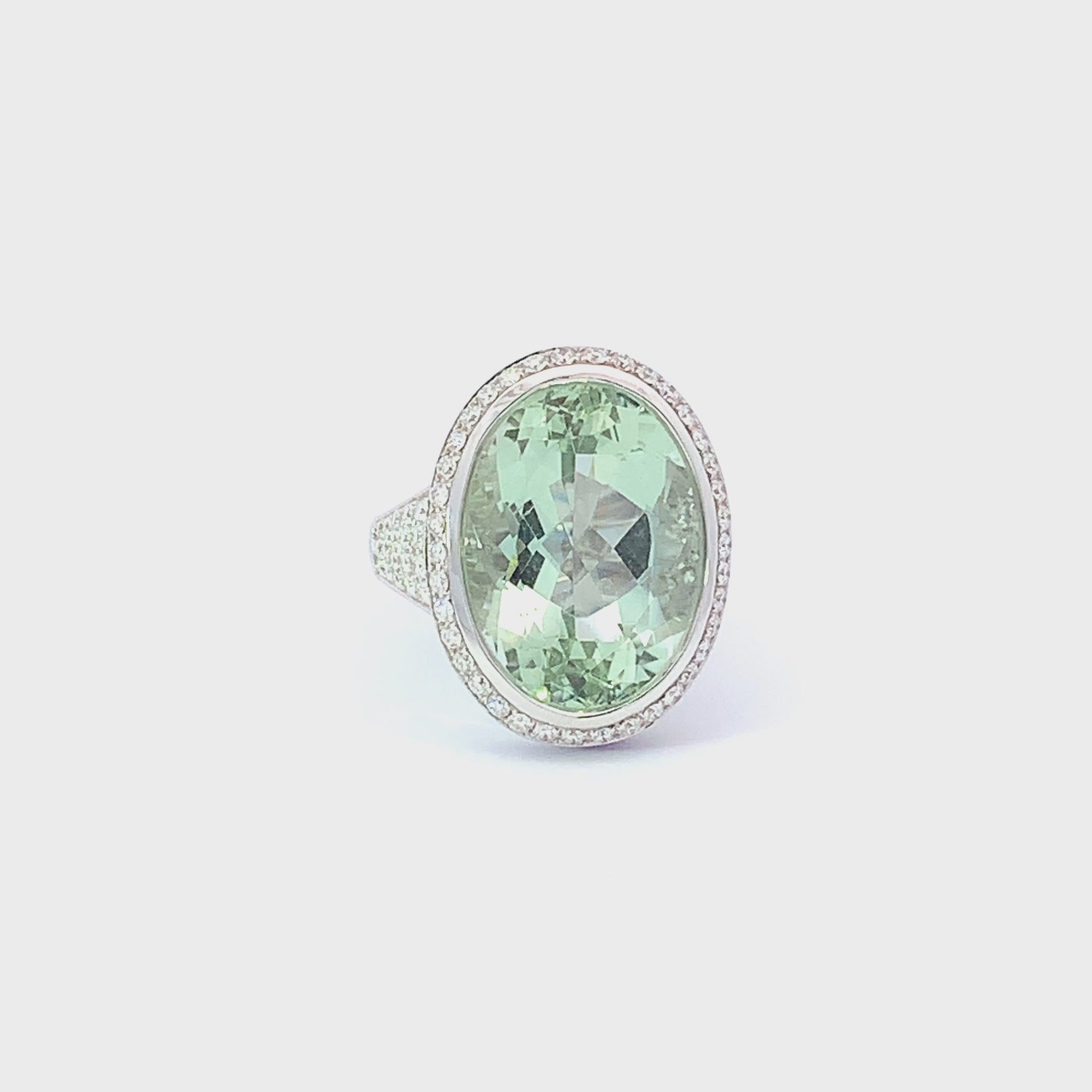 18ct White gold 14.32ct Green Beryl ring surrounded by amethyst and diamonds Ring Buchwald