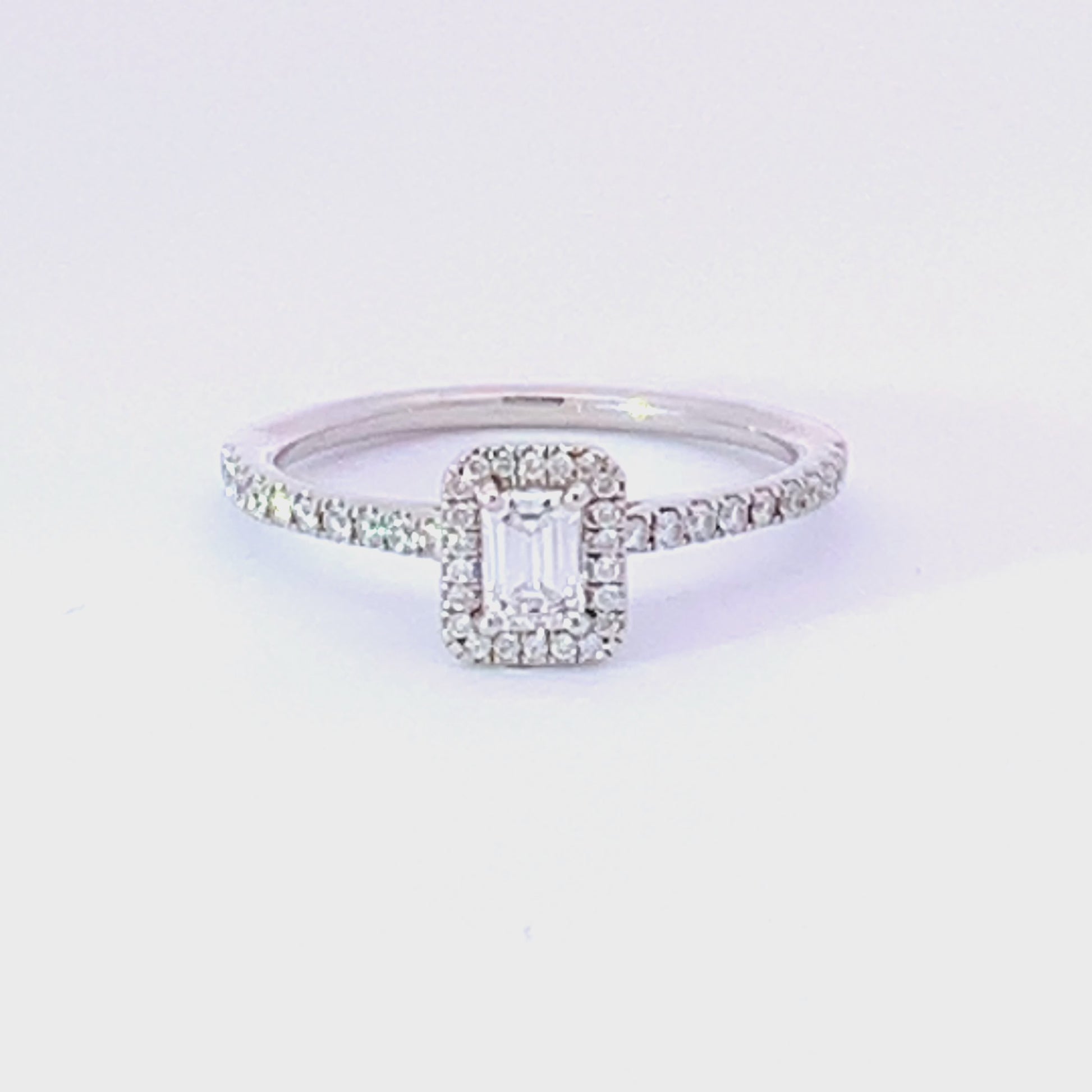 Platinum Emerald cut 0.27ct certified natural diamond ring. Ring Rock Lobster