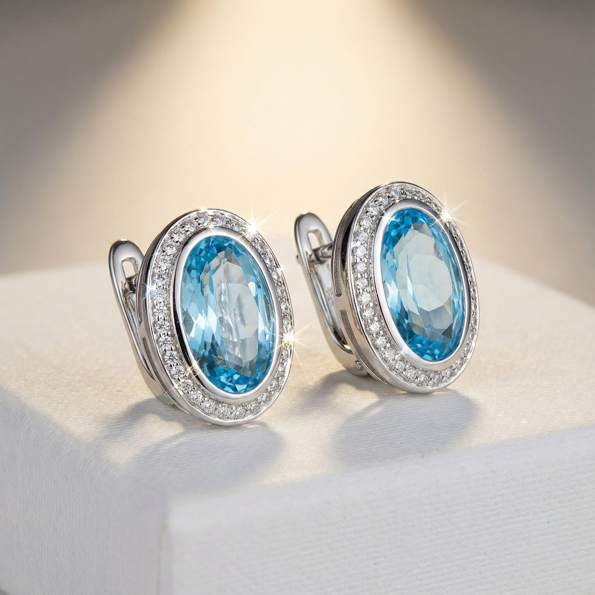 14ct White gold blue topaz and 0.35ct diamond stud earrings Earrings Breuning