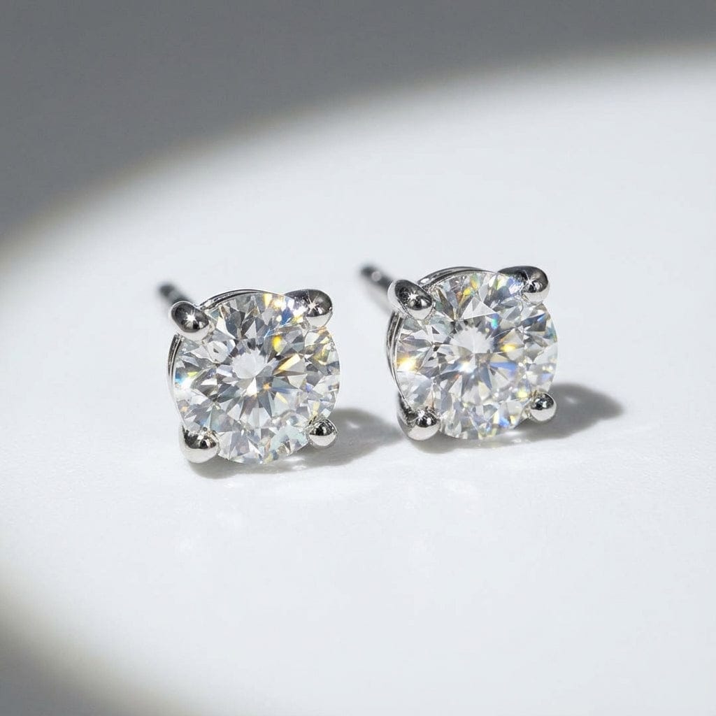 18ct white gold 0.50ct diamond four claw stud earrings