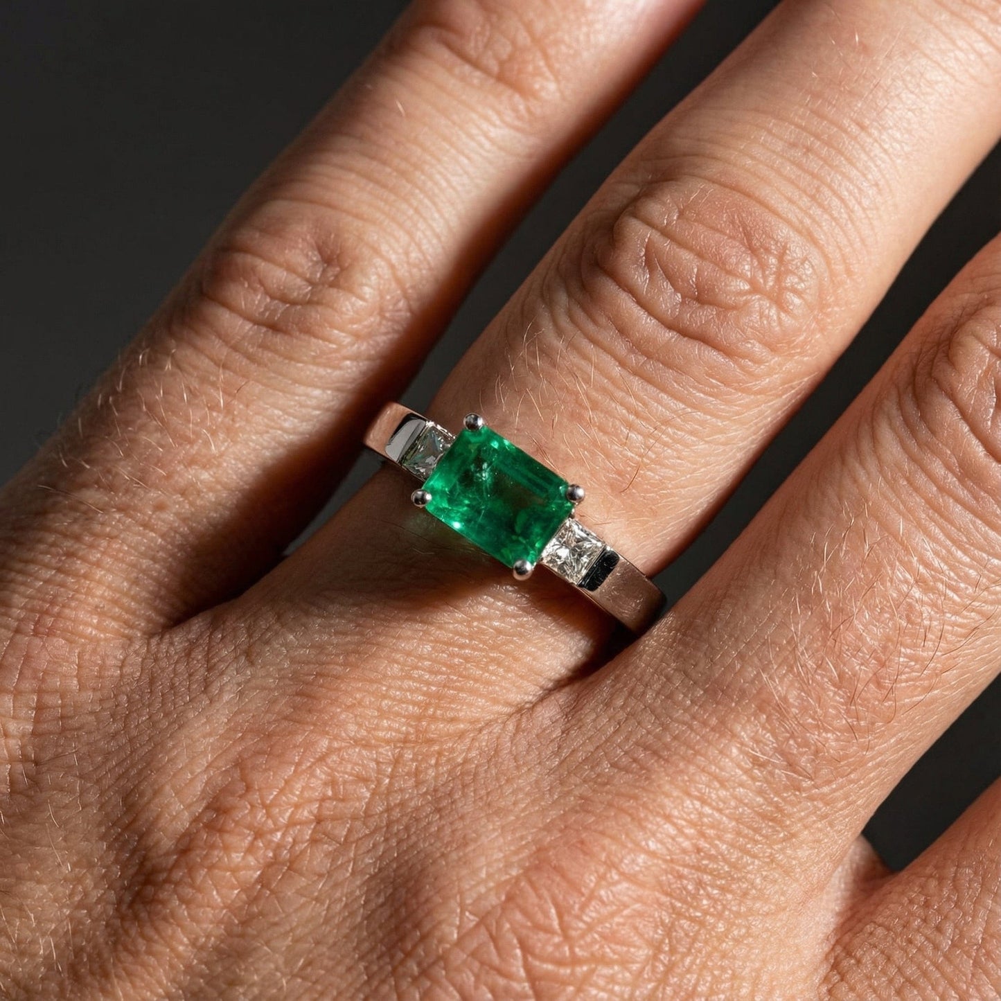 18ct White gold emerald and diamond trilogy ring Ring Buchwald