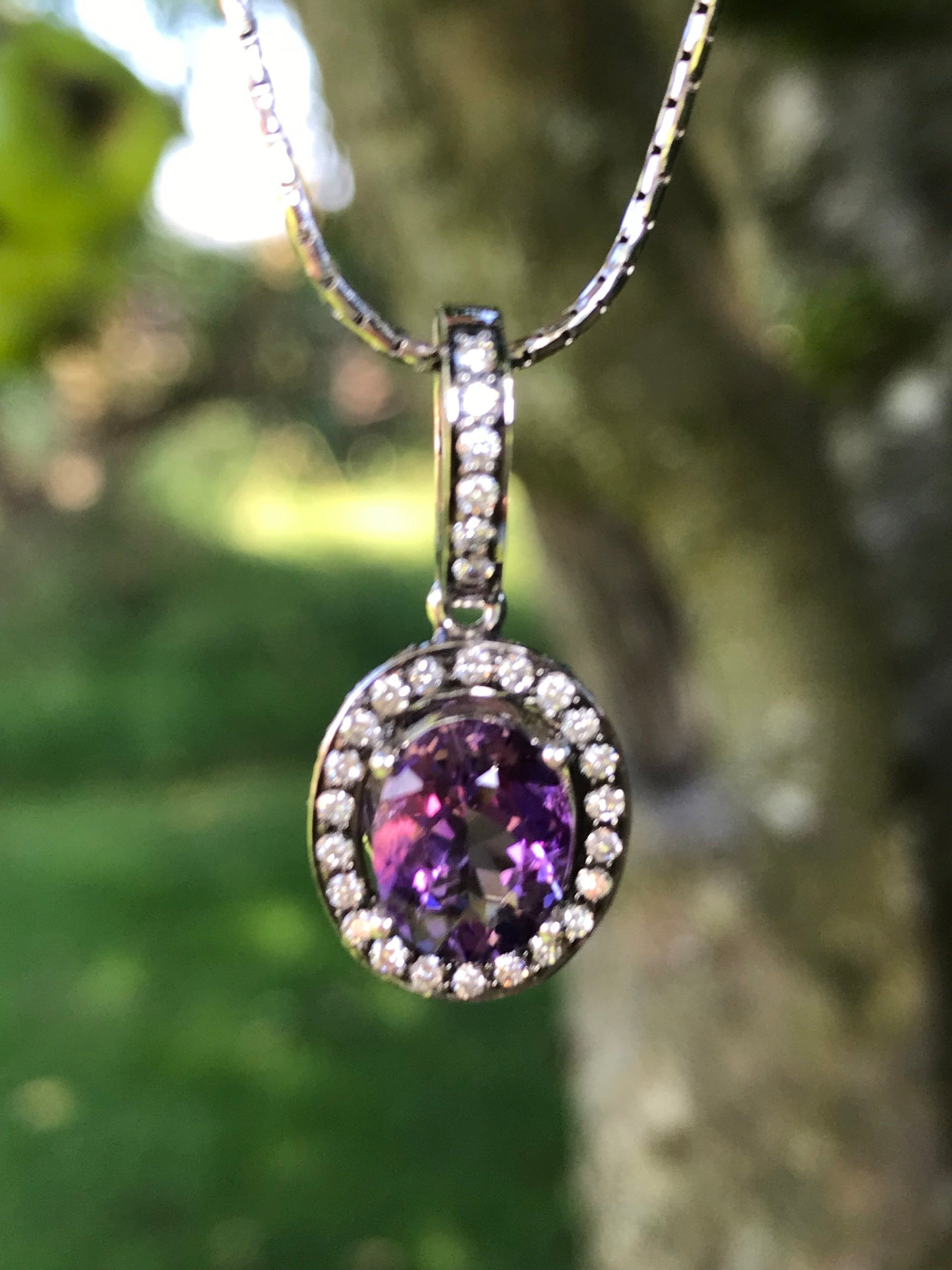 18ct white gold oval amethyst and diamond pendant Pendant Buchwald