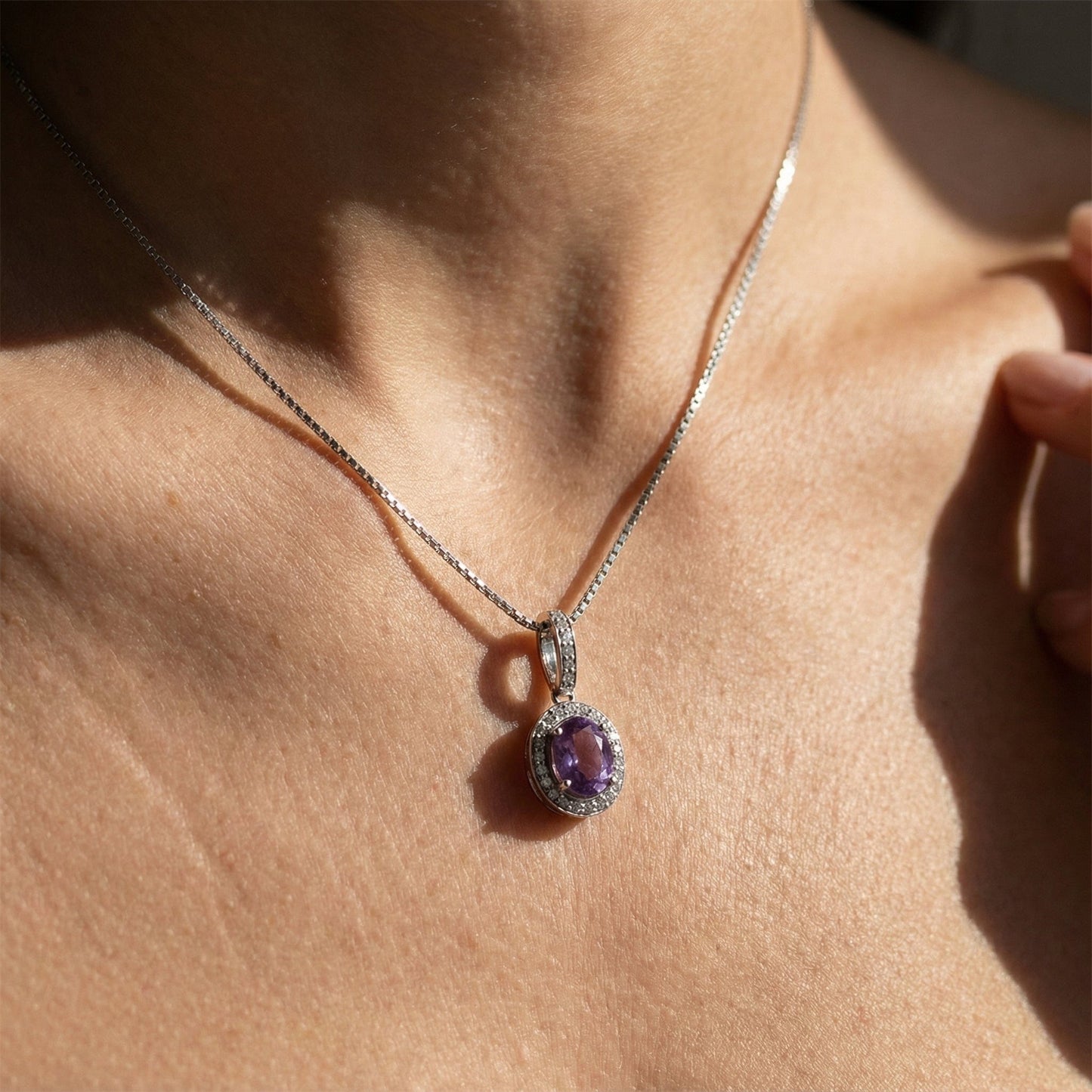 18ct white gold oval amethyst and diamond pendant Pendant Buchwald