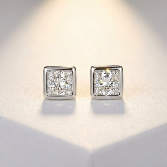 18ct white gold princess cut 0.40ct diamond earrings with rubover setting Earrings Hans Rivoir
