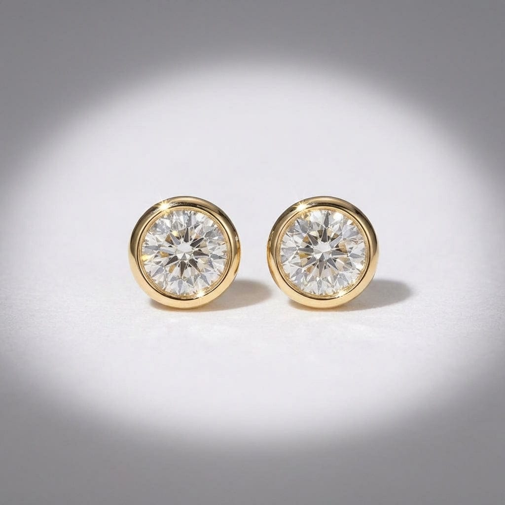 18ct yellow gold rubover 0.25 brilliant cut diamond earrings Earrings Hans Rivoir