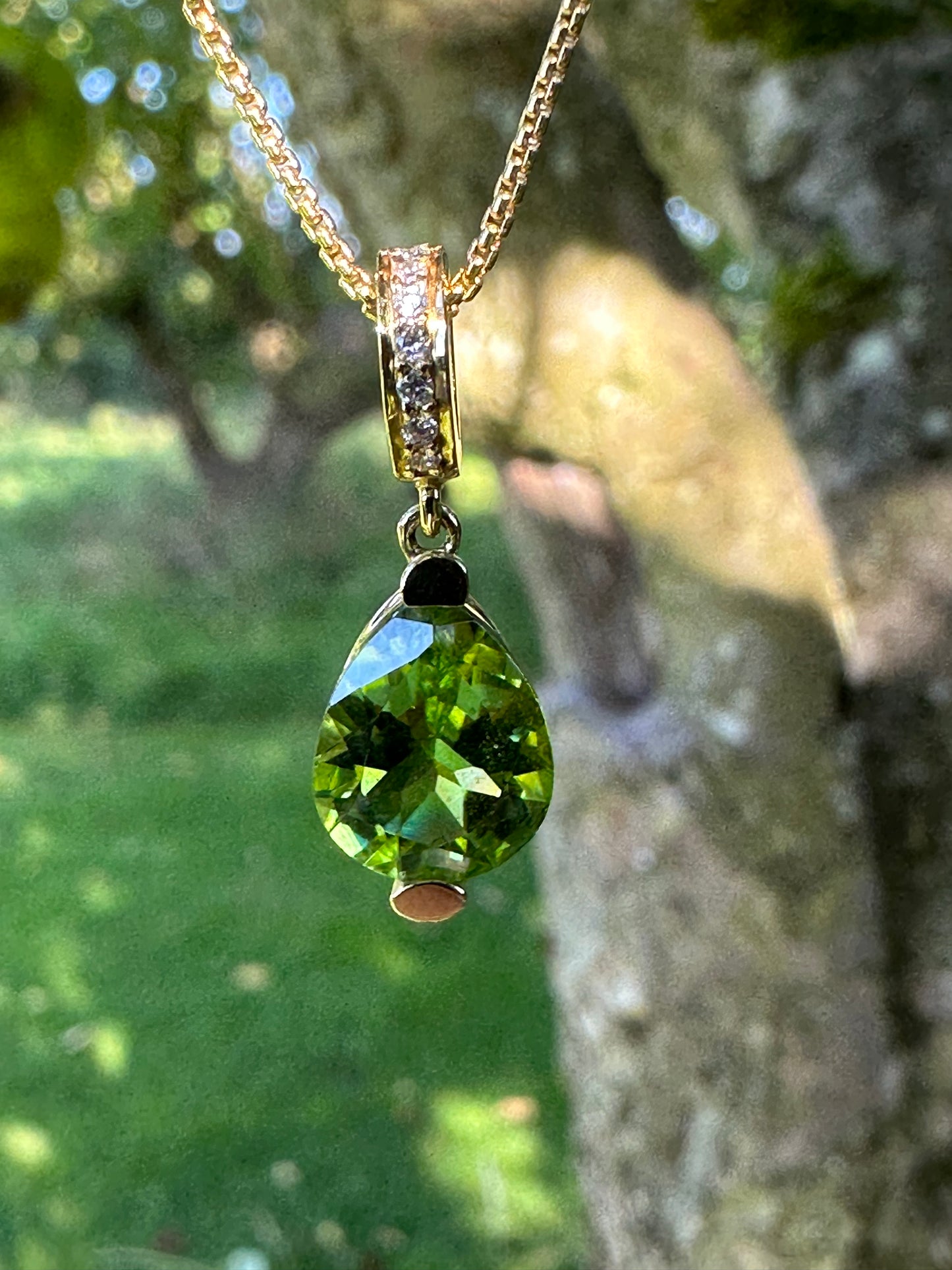 18ct Yellow gold peridot teardrop pendant with diamond set bail Pendant Buchwald