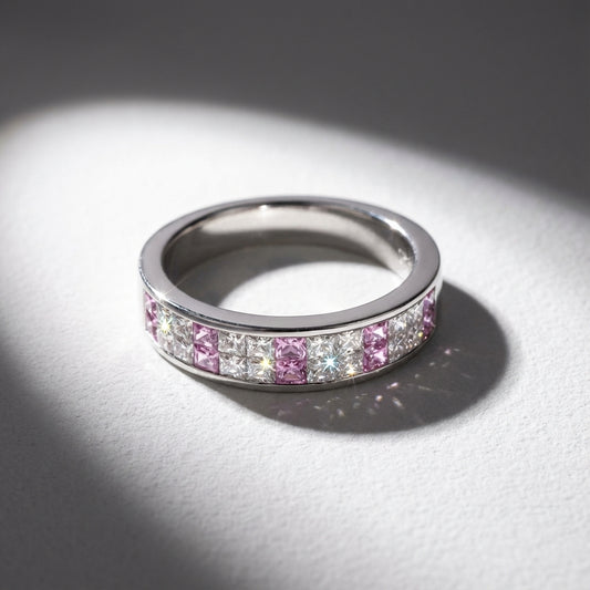 Platinum 0.72ct diamond and pink sapphire half eternity ring