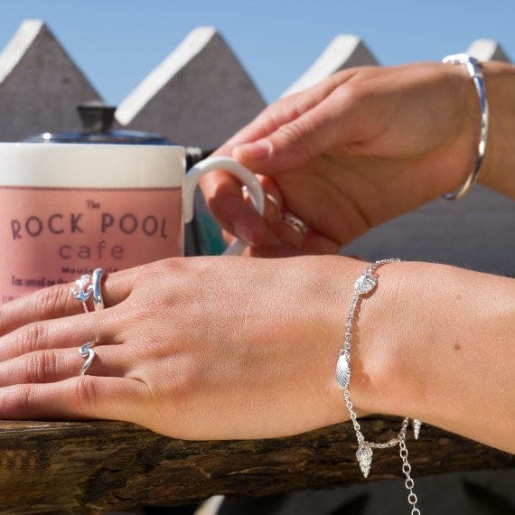 A simple silver organic shell charm bracelet Bracelets Sea Gems Ltd