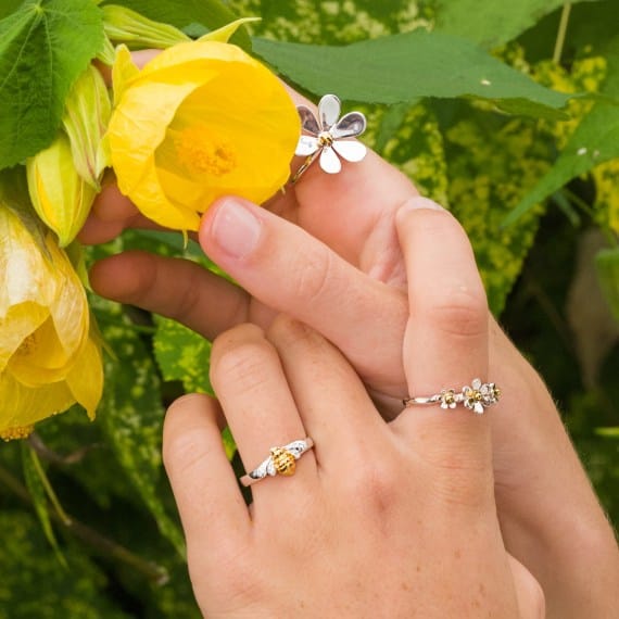 Delicate small two-toned 3 daisy design ring rings Sea Gems Ltd
