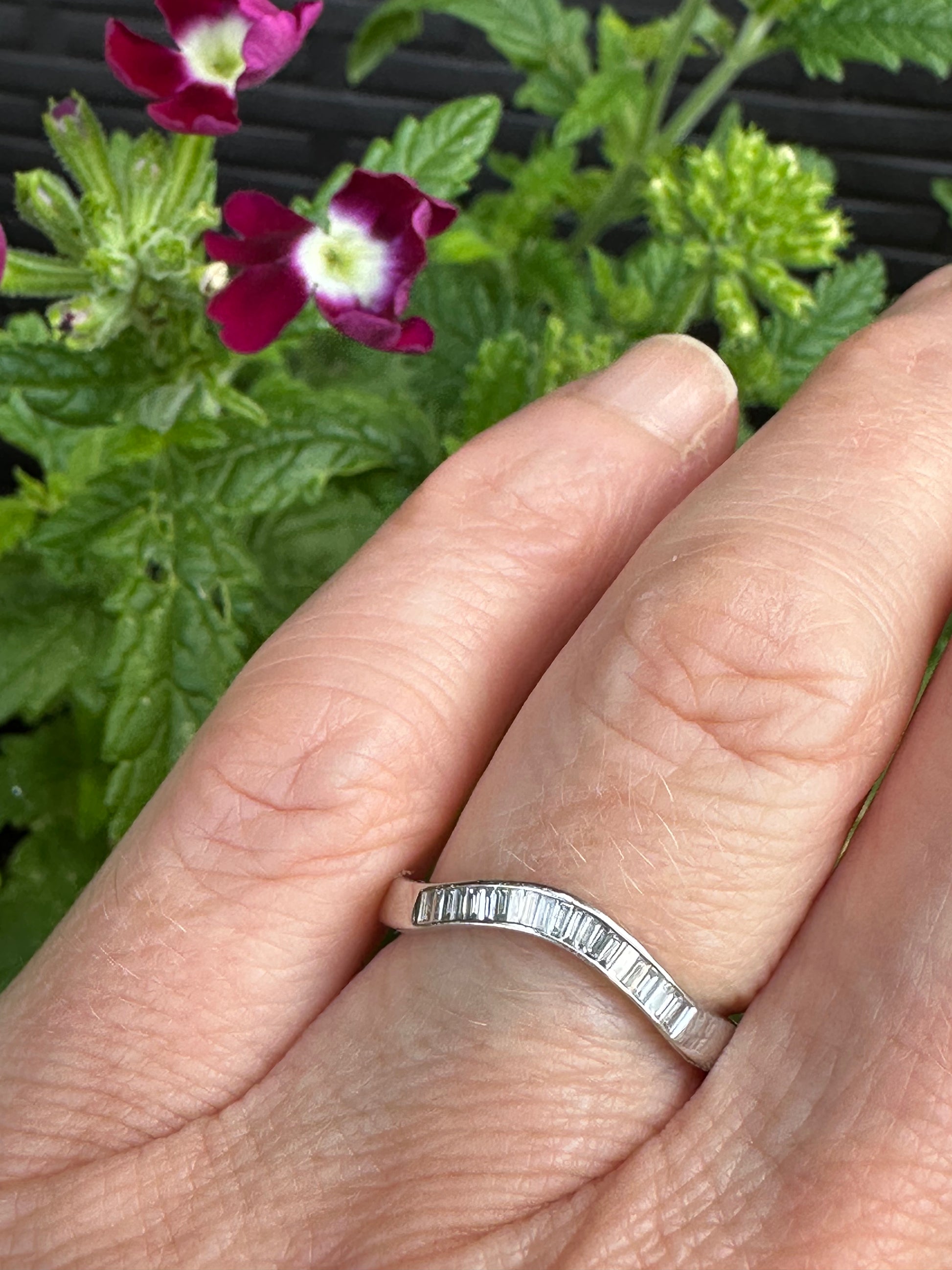 Platinum baguette certified diamond curved half eternity ring