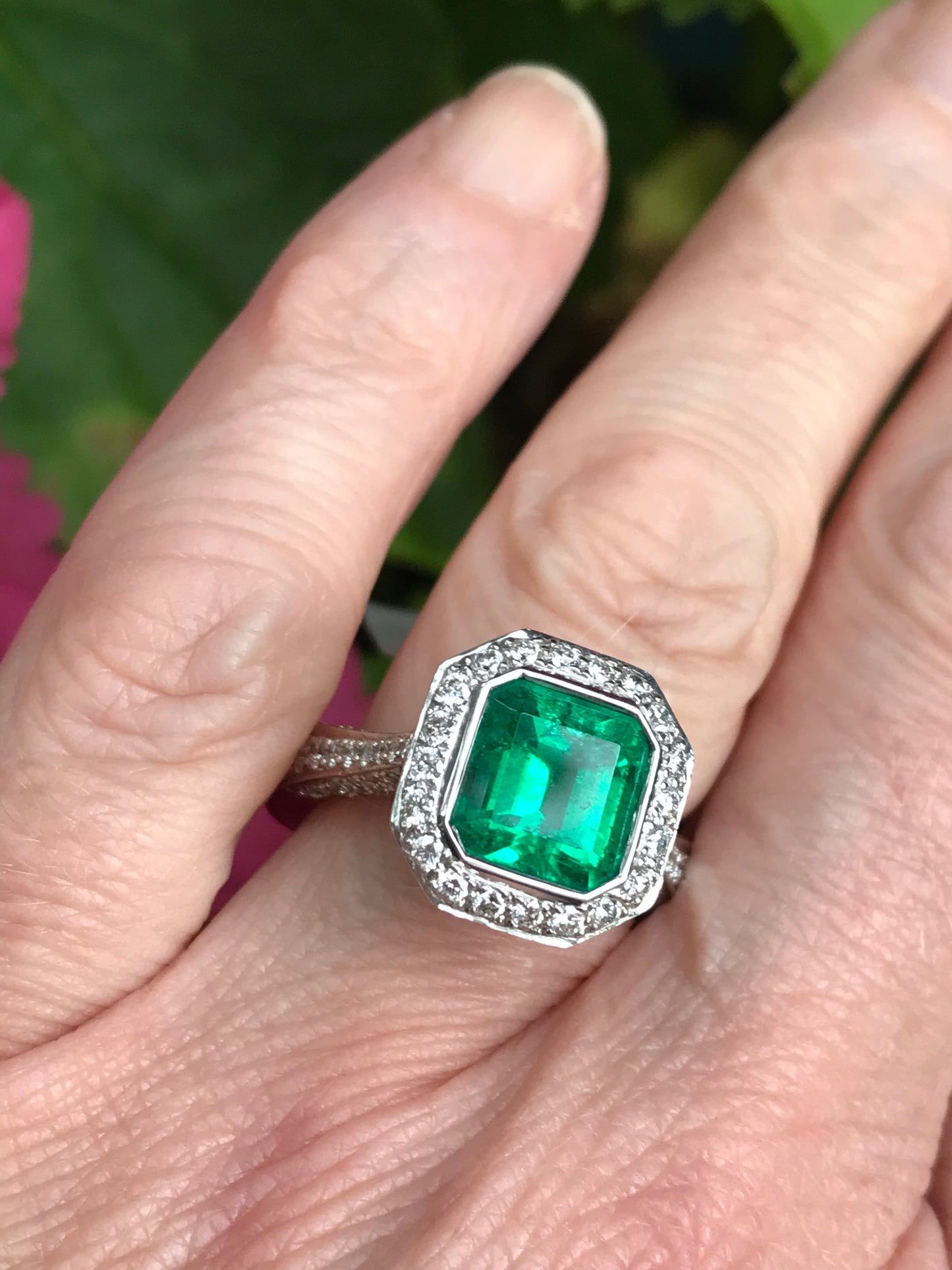 Emerald and 2025 topaz ring