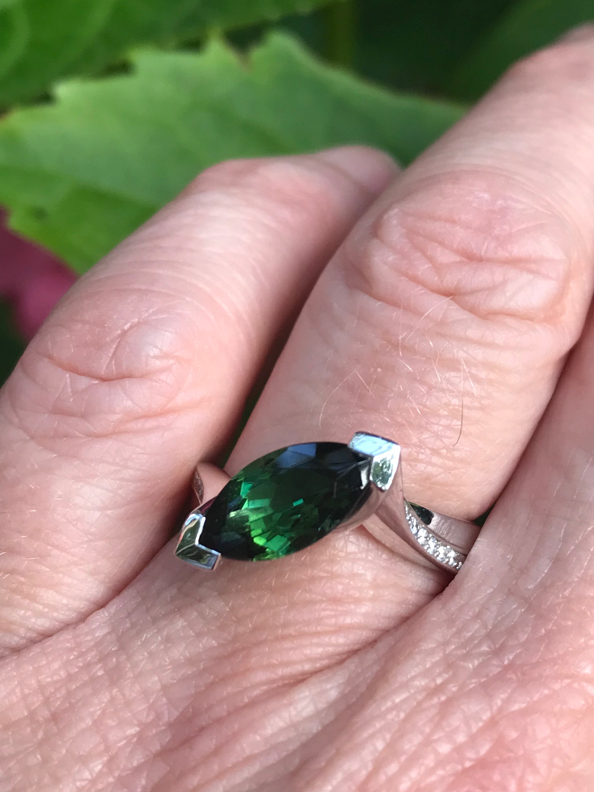 White gold ring hotsell with green stone