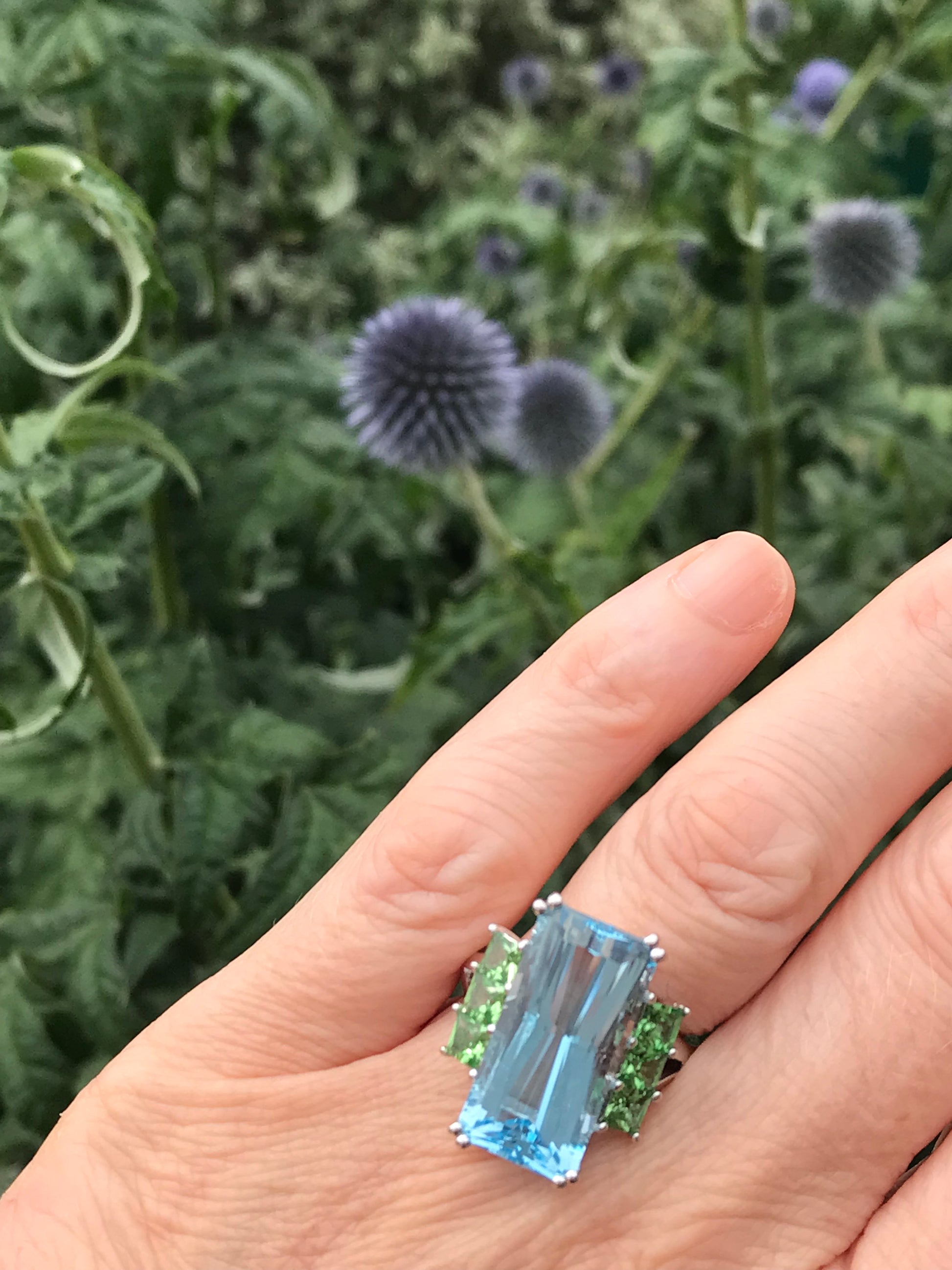 Diamond ring with blue topaz side stones sales