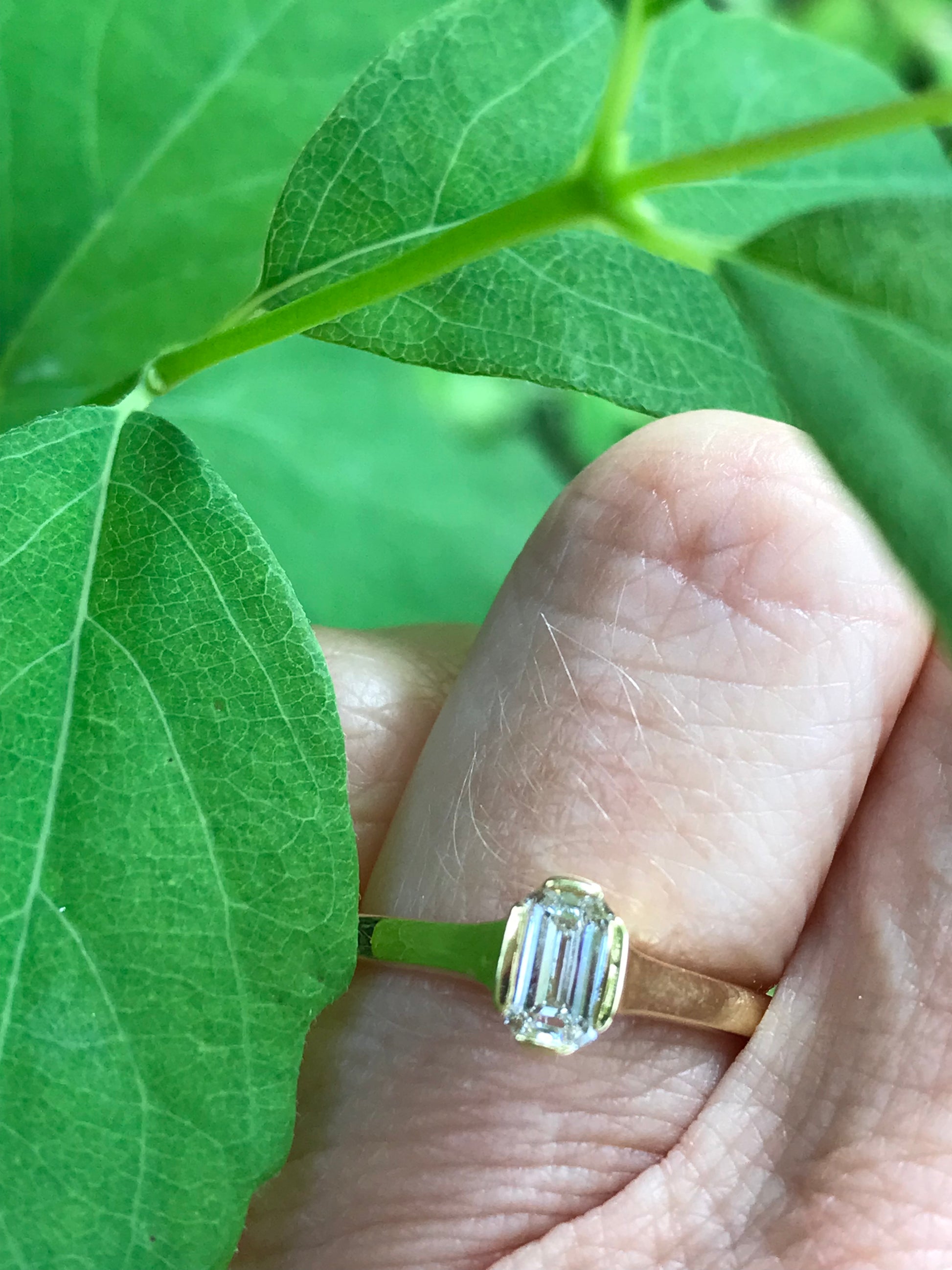 Two carat emerald cut diamond ring online