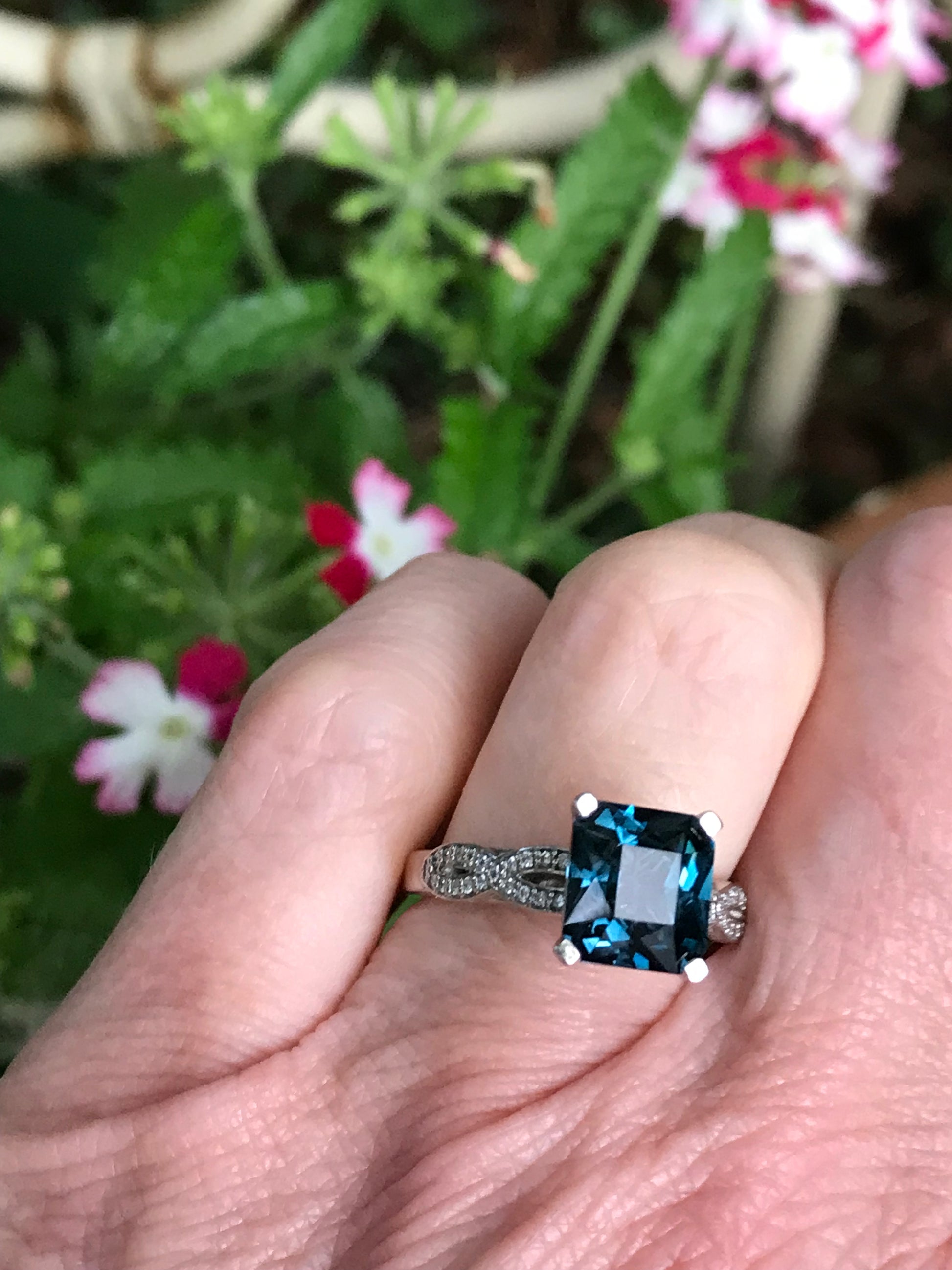 Palladium weaved shape ring set with a petrol blue spinel and diamonds Ring Stuller