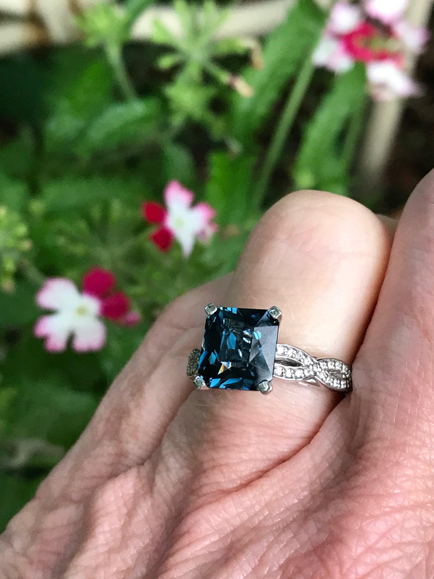 Palladium weaved shape ring set with a petrol blue spinel and diamonds Ring Stuller