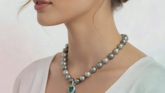 A Beautiful certified 4.20ct Emerald heart and Diamond attachment pendant Pendant Buchwald
