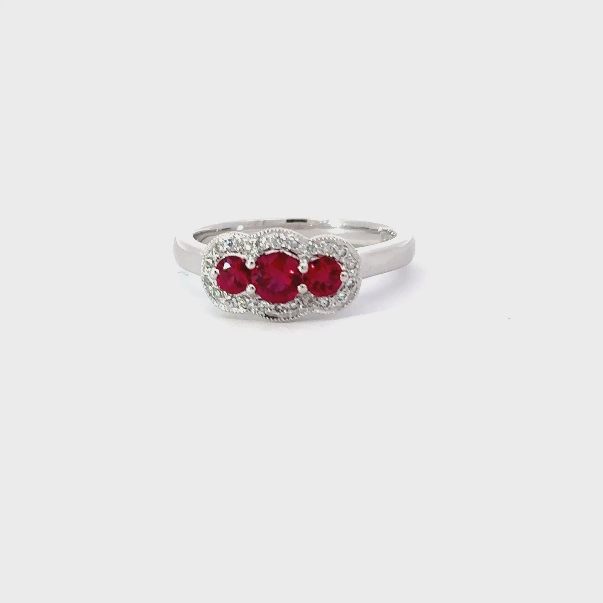 Platinum Ruby and diamond three stone halo ring Ring Rock Lobster