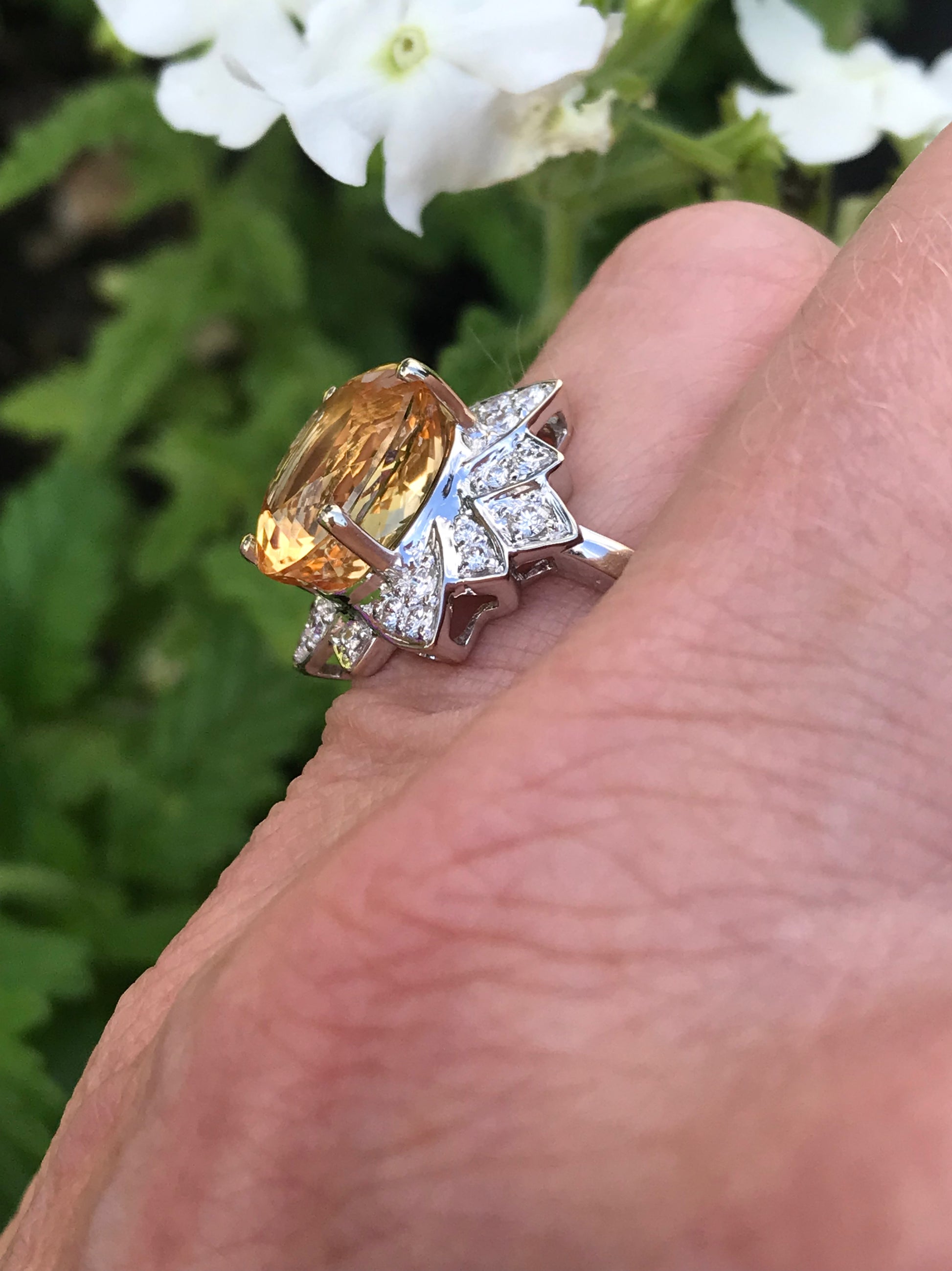 White gold imperial topaz ring set with a floral diamond surround Ring Rock Lobster