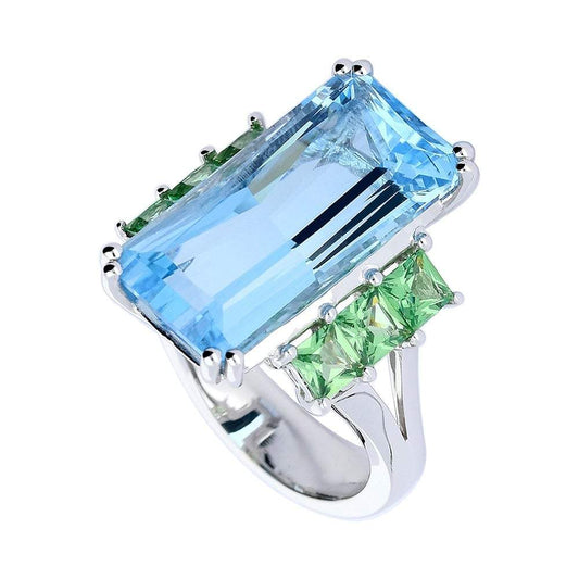 18ct White gold blue topaz ring with tzavorite side stones Ring Buchwald   
