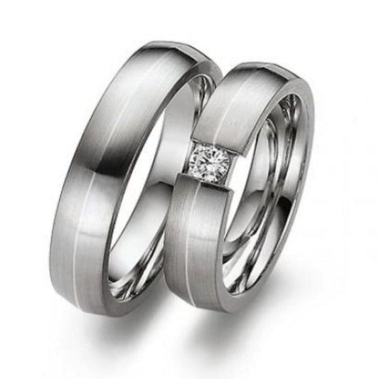 18ct white gold shaped band with a brilliant diamond Ring Gerstner   