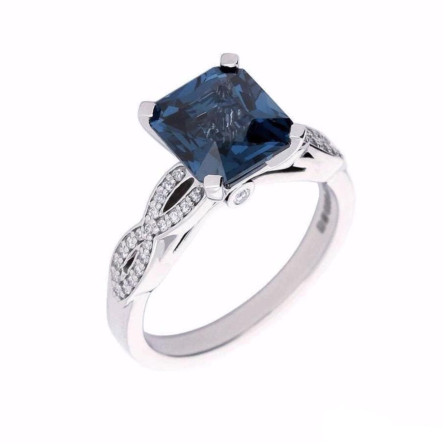 Palladium weaved shape ring set with a petrol blue spinel and diamonds Ring Stuller   